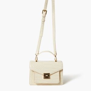 faux croc leather crossbody bag featuring a small structured body, flap top​​